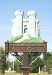 The castle and the Black Dog adorn the town sign