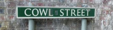 Roadsign with white writing on a green background
